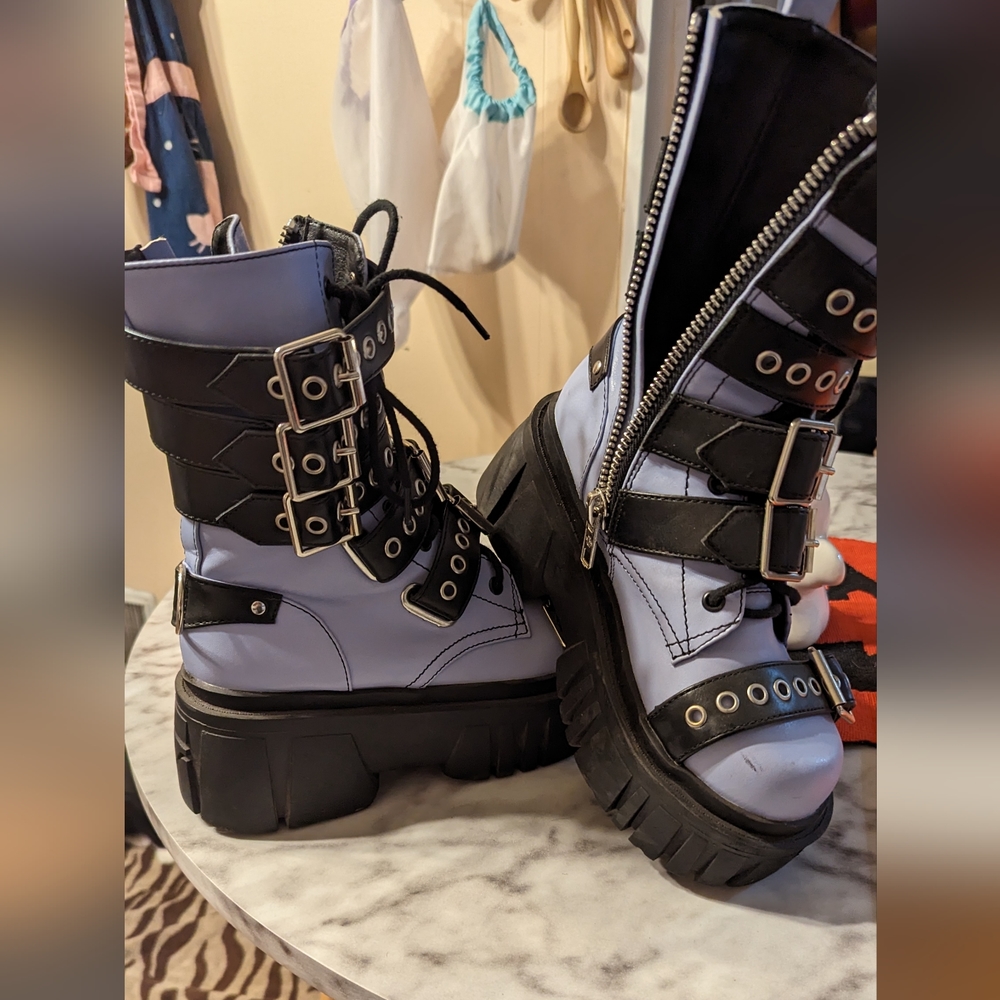 Dolls Kill bucked platform boots.